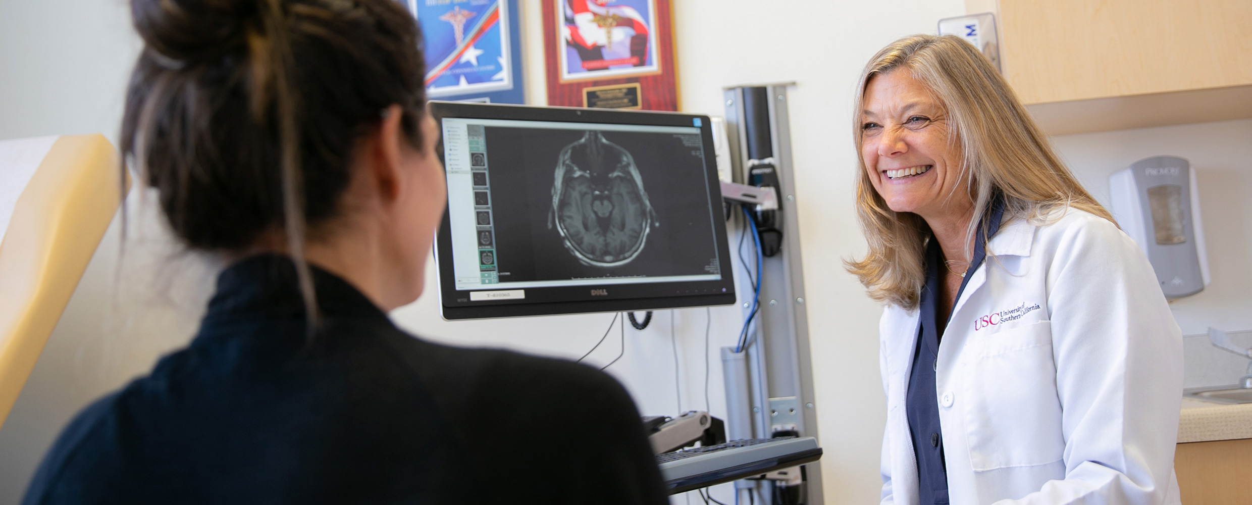 Doctor Christianne N. Heck, an epilepsy and neurology specialist at Keck Medicine of USC, with a patient