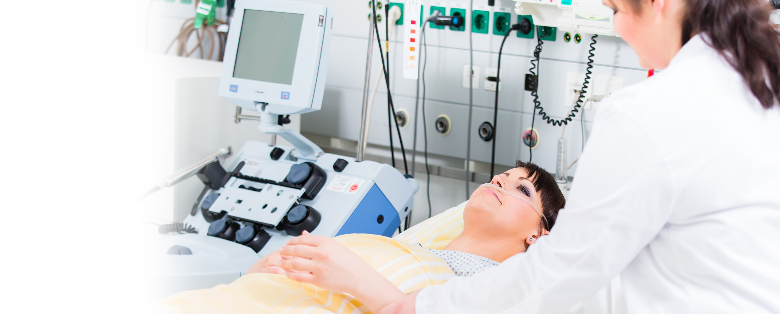 Doctor examines a female patient in a medical office
