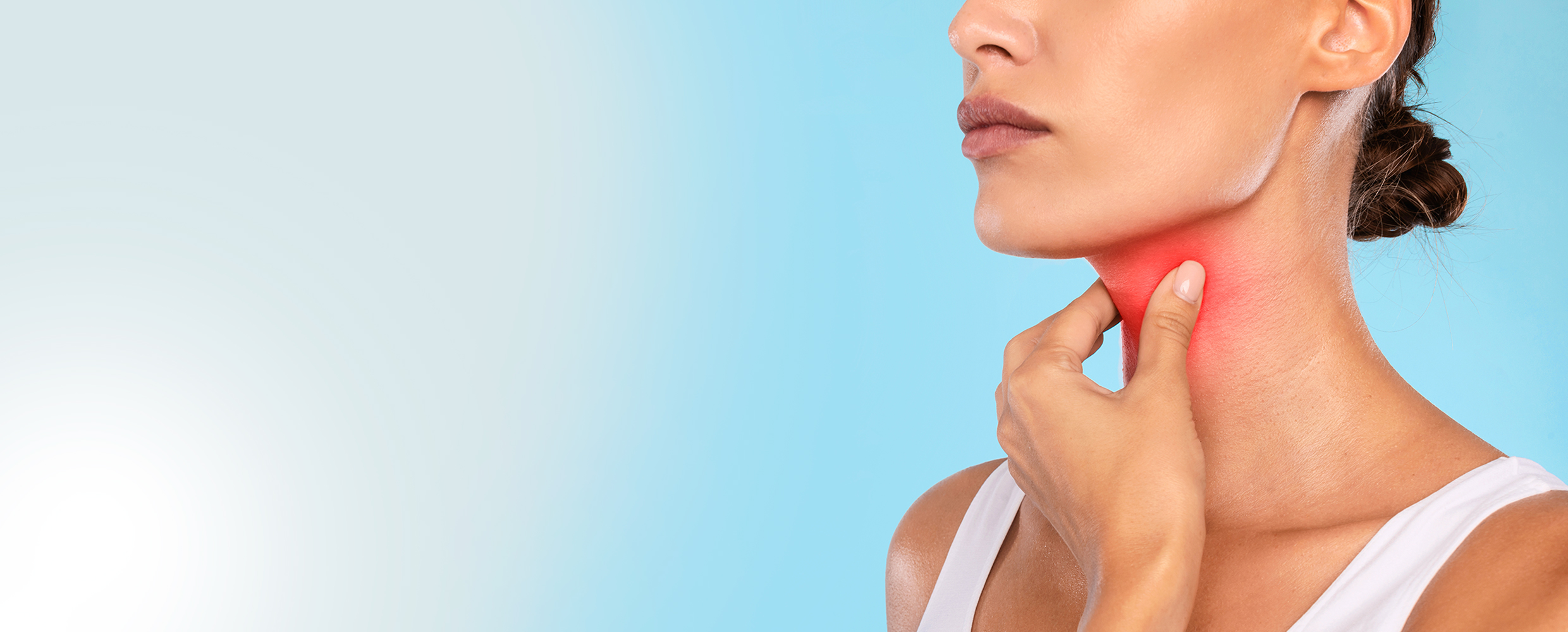 Woman touching her throat