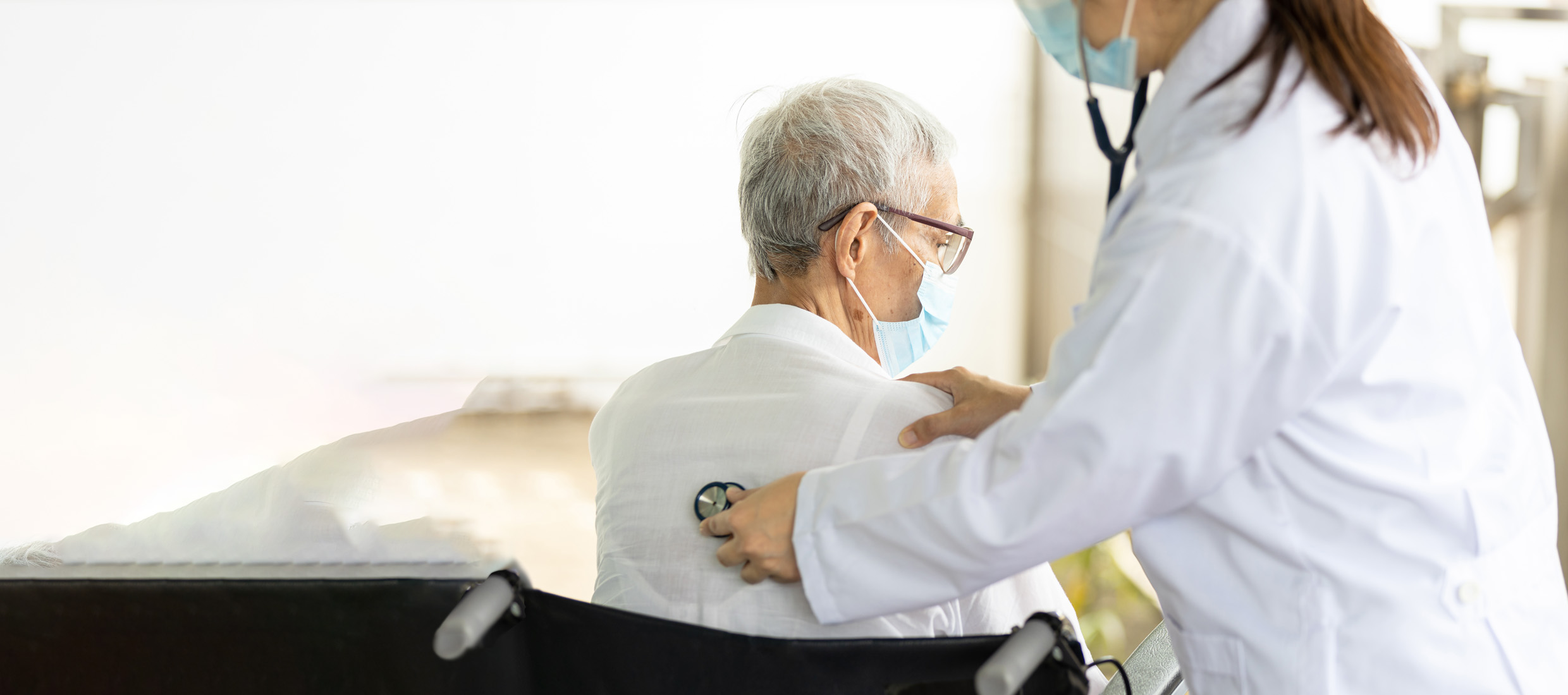 Doctor examining a patient with a stethoscope