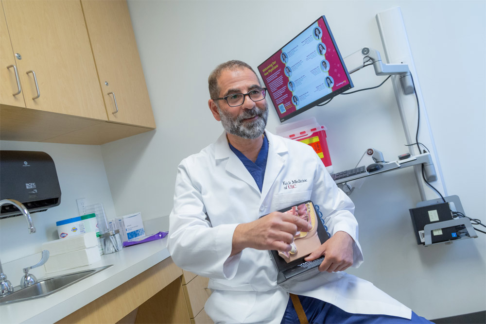 Dr. Leo Doumanian consults with a patient at USC Verdugo Hills Hospital