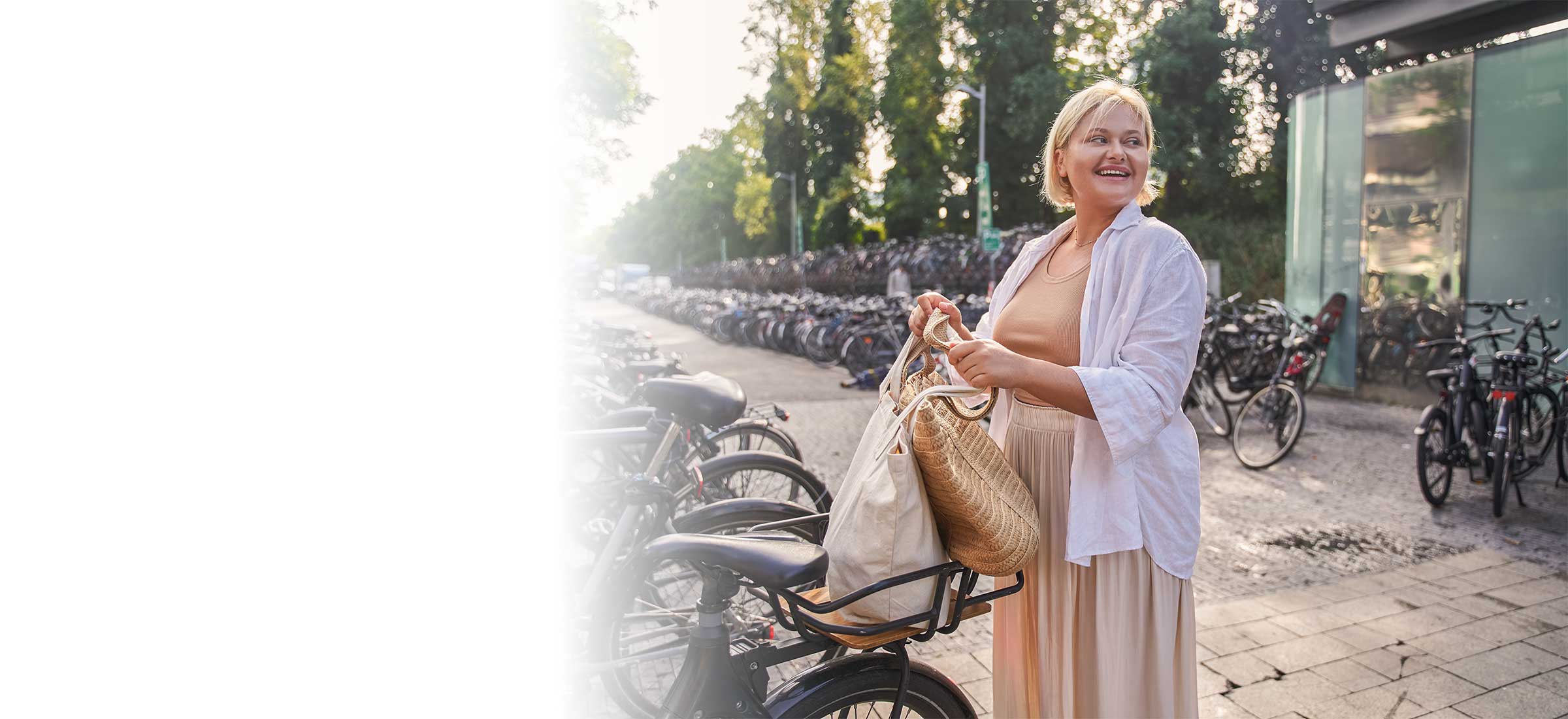 Person standing by a row of bikes