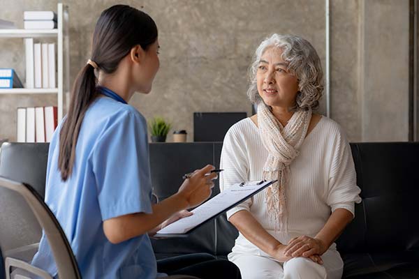 Nurse doing an intake with a patient