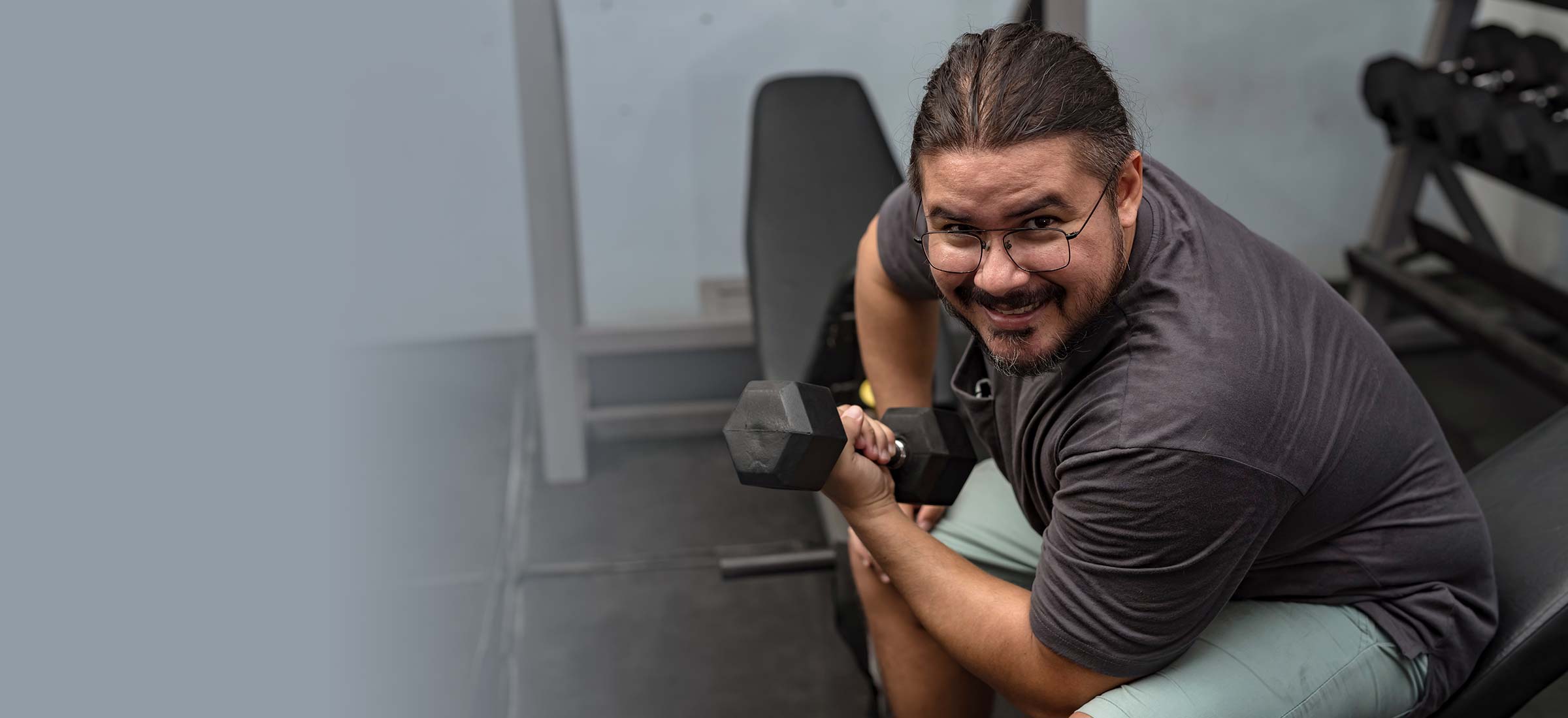 Person holding dumbells