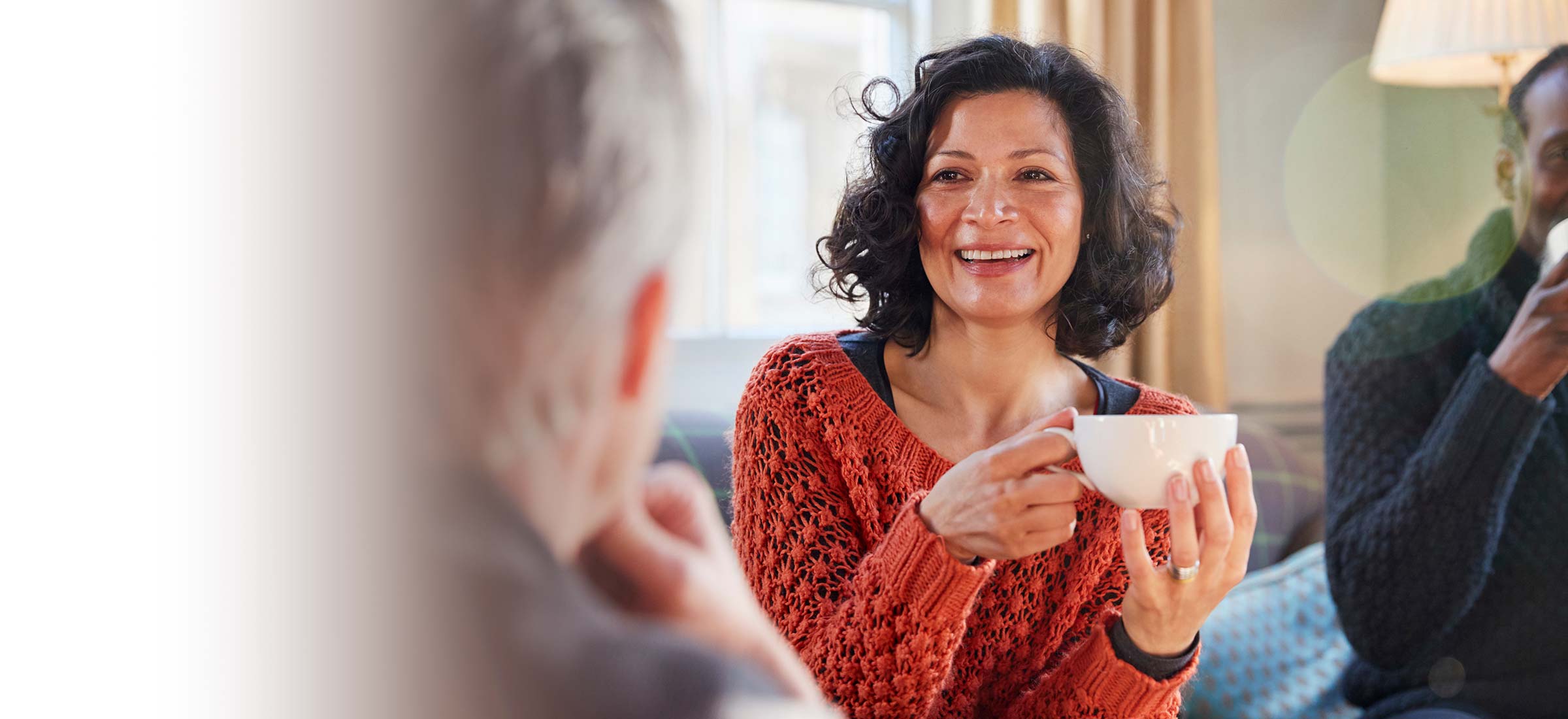 People enjoying a cup of coffee and tea